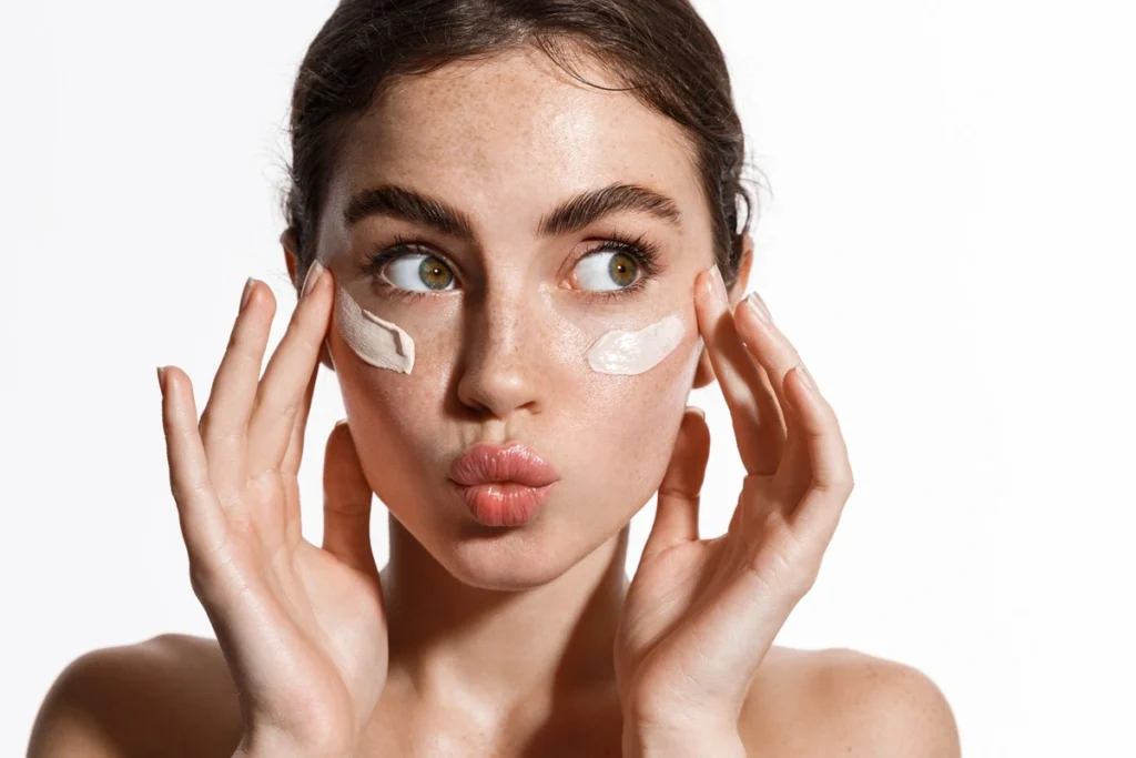 Woman applying facial skincare cream for morning skincare routine at Ara Med Spa in Beverly Hills CA